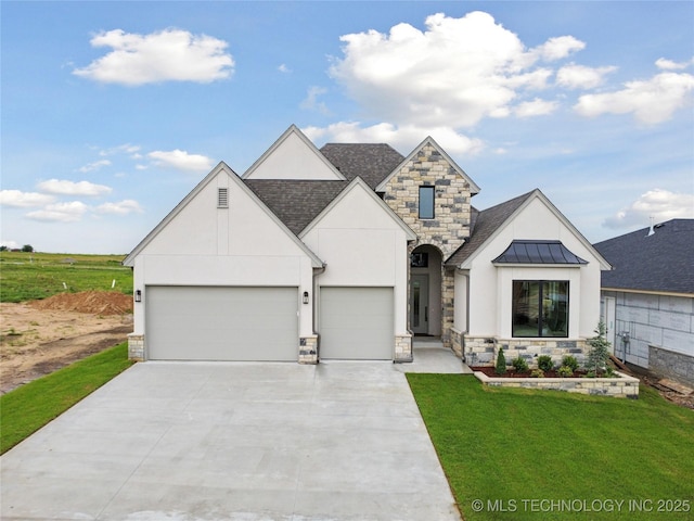 2607 E 135th Dr S, Bixby, OK 74008 - view of front of property with stone siding, stucco siding, a standing seam roof, a front yard, and concrete driveway