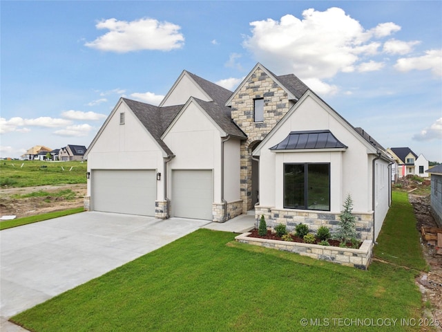 2607 E 135th Dr S, Bixby, OK 74008 - view of front facade with stone siding, a front yard, driveway, stucco siding, and a standing seam roof