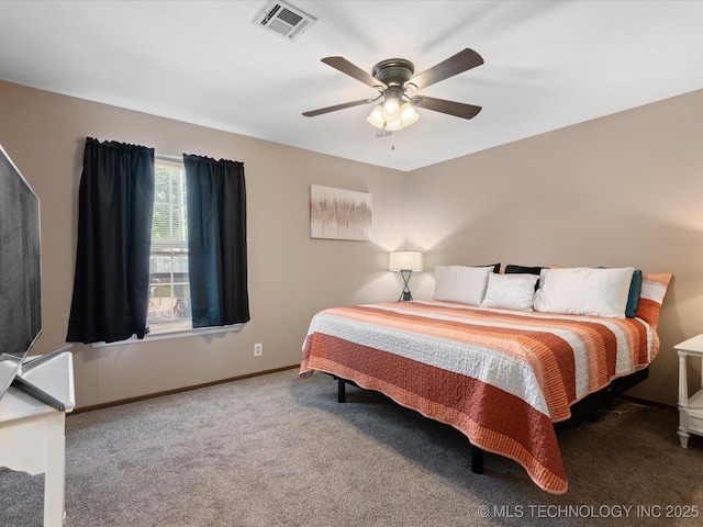 540 S Hamilton Ave, Dewey, OK 74029 - carpeted bedroom with baseboards and a ceiling fan
