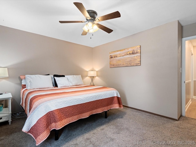 540 S Hamilton Ave, Dewey, OK 74029 - bedroom featuring carpet floors, baseboards, and ceiling fan