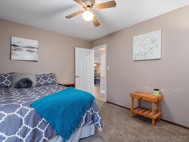540 S Hamilton Ave, Dewey, OK 74029 - bedroom with carpet floors, baseboards, and a ceiling fan