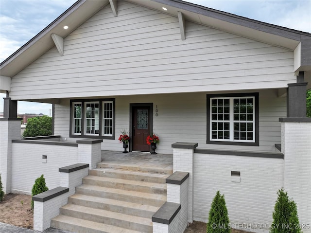 100 E Broadway, Sulphur, OK 73086 - view of front facade featuring covered porch