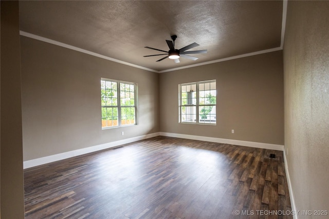 100 E Broadway, Sulphur, OK 73086 - spare room with dark wood-style floors, a ceiling fan, baseboards, ornamental molding, and a textured ceiling