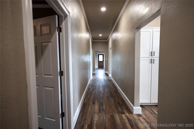 100 E Broadway, Sulphur, OK 73086 - hallway with dark wood-style floors, a textured wall, crown molding, baseboards, and recessed lighting