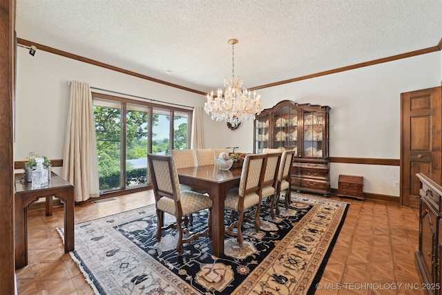 2956 E 69th St, Tulsa, OK 74136 - dining room with a chandelier, ornamental molding, a textured ceiling, and baseboards