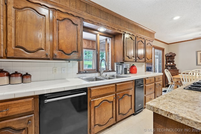 2956 E 69th St, Tulsa, OK 74136 - kitchen featuring black dishwasher, a sink, crown molding, tasteful backsplash, and a textured ceiling