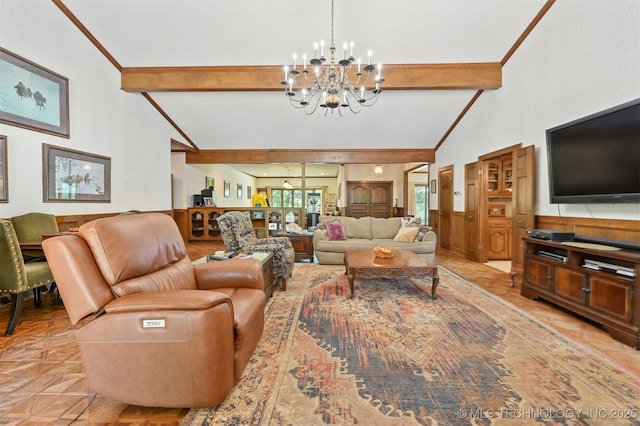 2956 E 69th St, Tulsa, OK 74136 - living room with a chandelier, beamed ceiling, wainscoting, and high vaulted ceiling