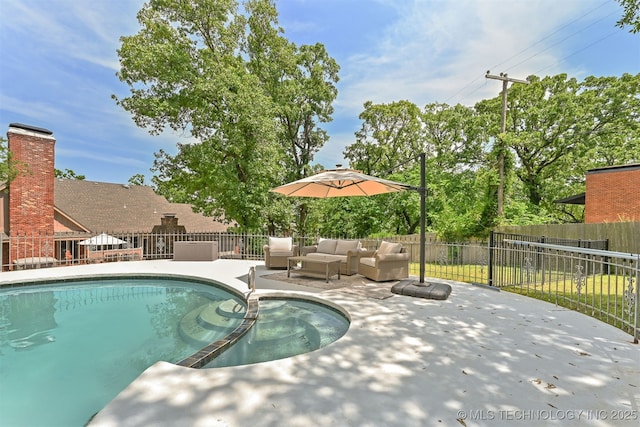 2956 E 69th St, Tulsa, OK 74136 - view of pool featuring a pool with connected hot tub, a fenced backyard, a patio, and an outdoor hangout area