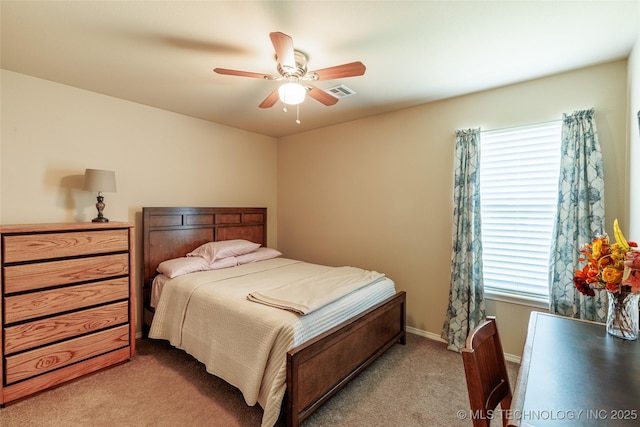 23218 Bessie Blvd, Claremore, OK 74019 - bedroom featuring multiple windows, light carpet, ceiling fan, and baseboards