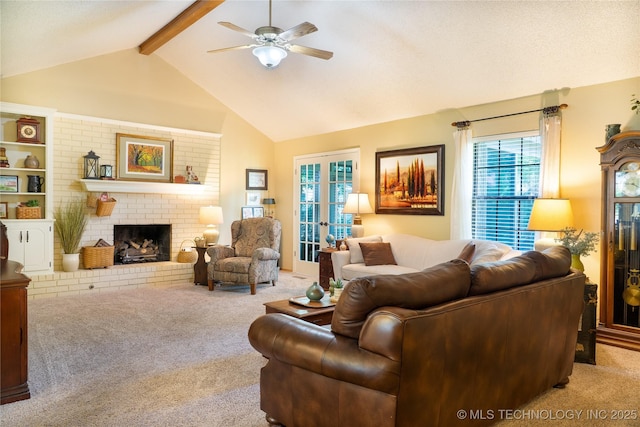 15919 E 79th St N, Owasso, OK 74055 - carpeted living room featuring ceiling fan and a fireplace