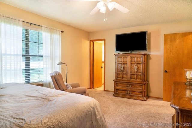 15919 E 79th St N, Owasso, OK 74055 - carpeted bedroom with a ceiling fan