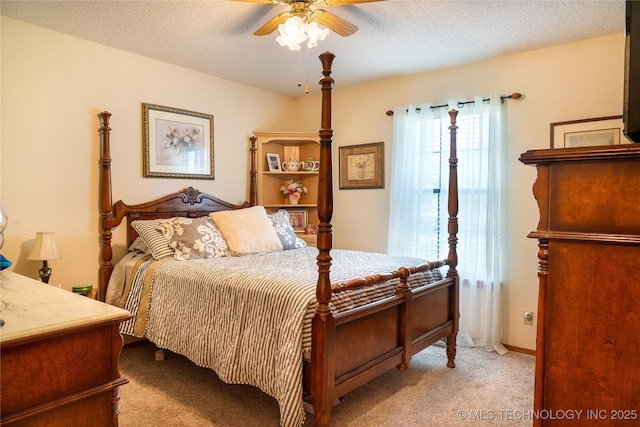 15919 E 79th St N, Owasso, OK 74055 - bedroom with carpet flooring, a textured ceiling, and a ceiling fan