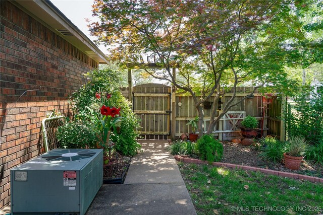15919 E 79th St N, Owasso, OK 74055 - view of yard featuring a gate and fence