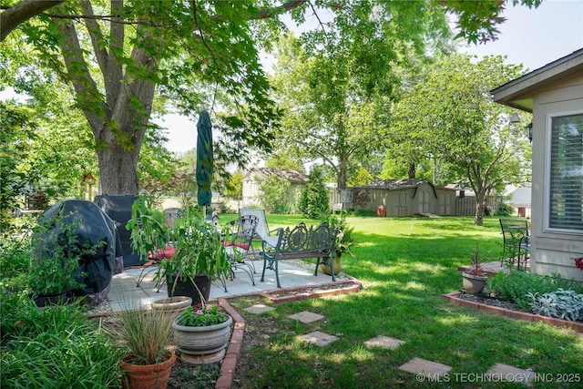 15919 E 79th St N, Owasso, OK 74055 - view of grassy yard with a patio and an outdoor structure