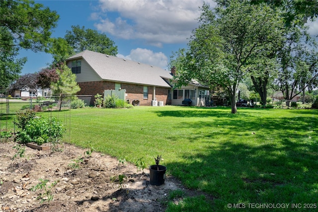15919 E 79th St N, Owasso, OK 74055 - view of yard with a vegetable garden