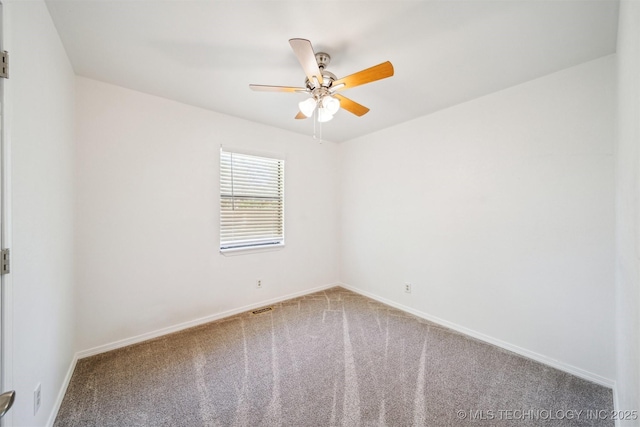 1010 S Wewoka Ave, Claremore, OK 74017 - unfurnished room featuring carpet, a ceiling fan, and baseboards