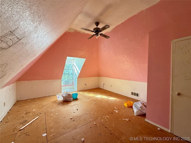 bonus room featuring vaulted ceiling, ceiling fan, and cooling unit