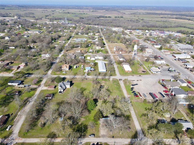 aerial overview of property's location with nearby suburban area