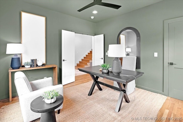 home office featuring wood finished floors, a ceiling fan, and recessed lighting