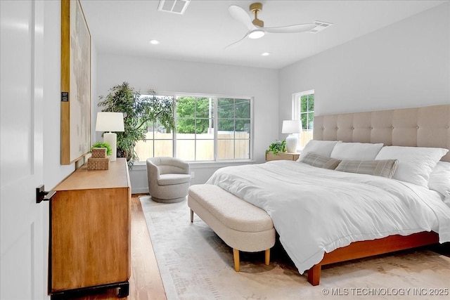 bedroom featuring light wood-style floors, recessed lighting, and a ceiling fan