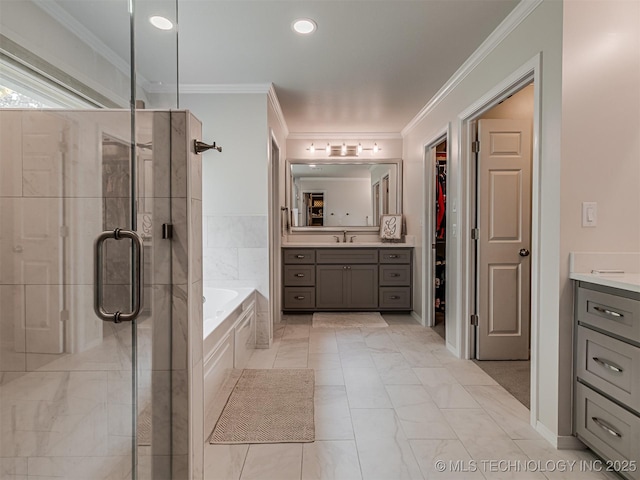 5517 E 101st Pl, Tulsa, OK 74137 - full bath featuring vanity, a shower stall, a garden tub, ornamental molding, and a spacious closet