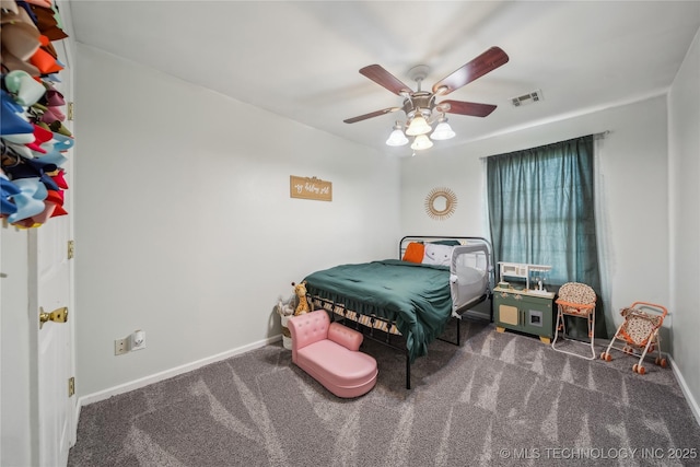 carpeted bedroom featuring baseboards and a ceiling fan
