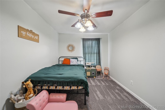 bedroom with carpet floors, baseboards, and ceiling fan