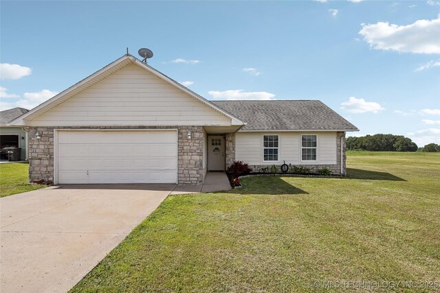 view of front of house with a front lawn, stone siding, an attached garage, concrete driveway, and a shingled roof