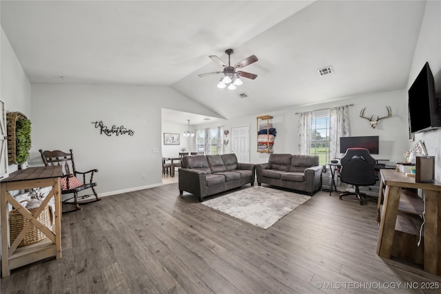 living area with a ceiling fan, wood finished floors, an office area, and lofted ceiling