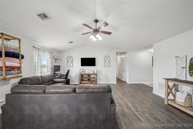 living room with ceiling fan, wood finished floors, lofted ceiling, baseboards, and a desk