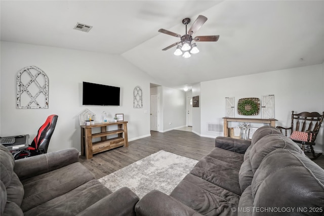 living room with ceiling fan, lofted ceiling, wood finished floors, and baseboards