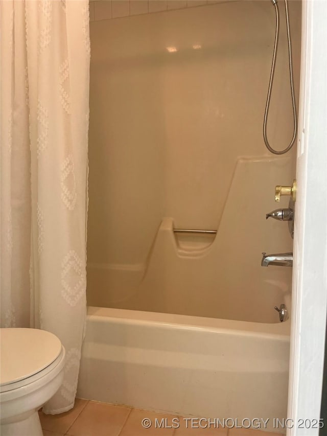 3164 S 101st E Ave Unit 801, Tulsa, OK 74146 - bathroom with tile patterned flooring, shower / tub combo with curtain, and toilet