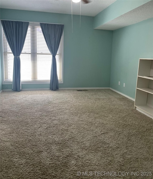 3164 S 101st E Ave Unit 801, Tulsa, OK 74146 - carpeted empty room with baseboards and a ceiling fan