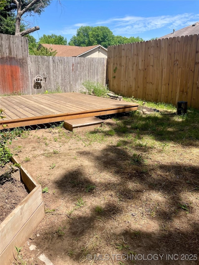 3164 S 101st E Ave Unit 801, Tulsa, OK 74146 - fenced backyard featuring a deck