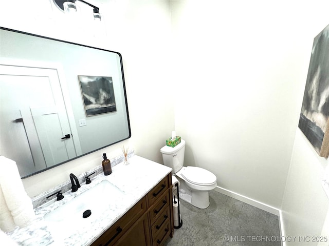 116645 S 4215th Rd, Eufaula, OK 74432 - bathroom featuring toilet, vanity, and baseboards
