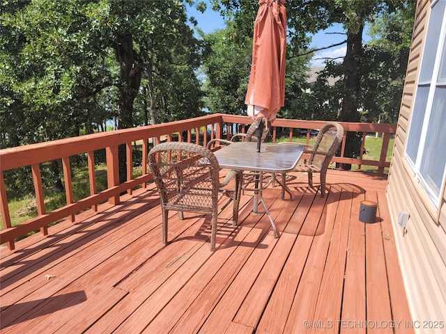 363 W 1700th Rd, Stigler, OK 74432 - deck with outdoor dining area
