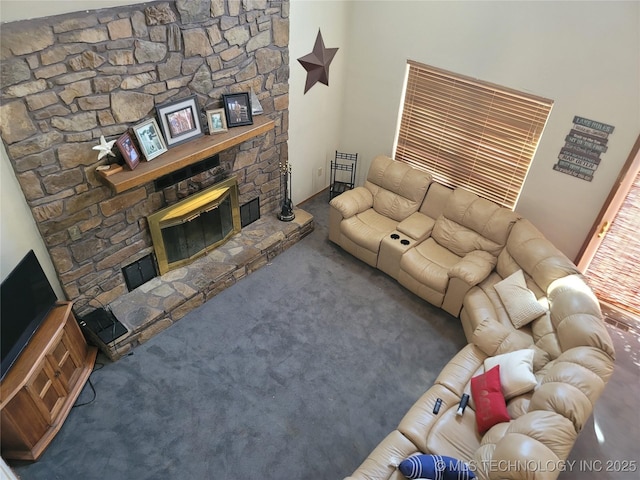 363 W 1700th Rd, Stigler, OK 74432 - living room with carpet flooring and a fireplace