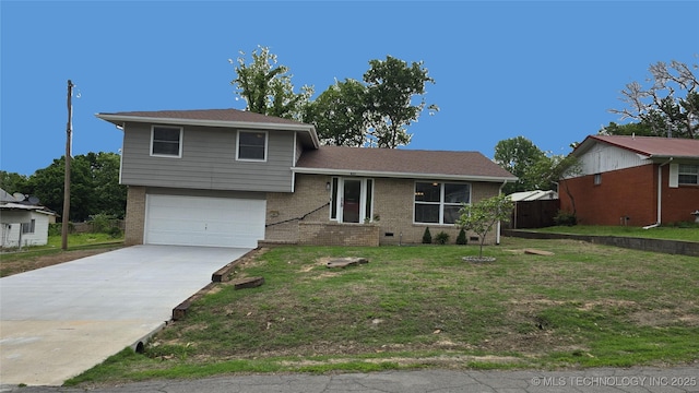 411 S 3rd, Eufaula, OK 74432 - tri-level home featuring an attached garage, brick siding, driveway, and a front yard