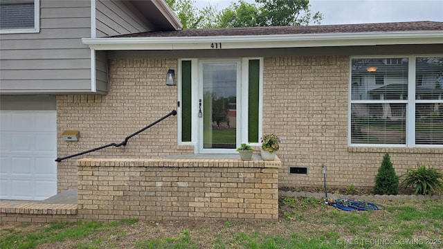 411 S 3rd, Eufaula, OK 74432 - view of exterior entry featuring brick siding