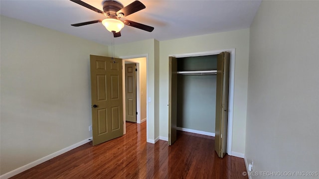 411 S 3rd, Eufaula, OK 74432 - unfurnished bedroom featuring wood finished floors, a closet, baseboards, and ceiling fan