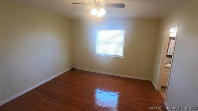 411 S 3rd, Eufaula, OK 74432 - unfurnished room featuring healthy amount of natural light, wood finished floors, a ceiling fan, and baseboards