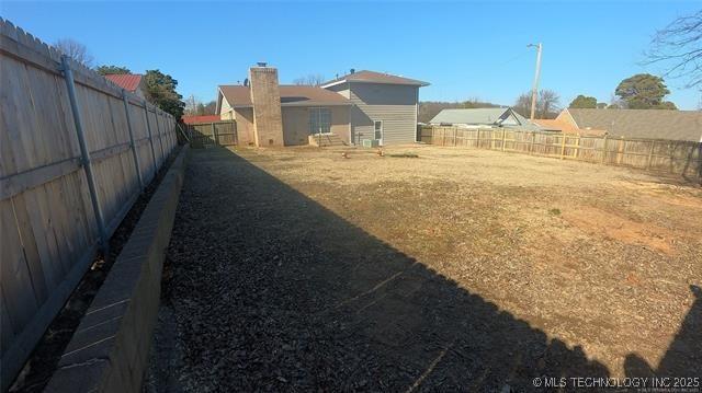 411 S 3rd, Eufaula, OK 74432 - view of fenced backyard