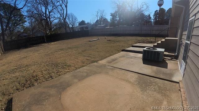 411 S 3rd, Eufaula, OK 74432 - view of yard with a patio and central AC