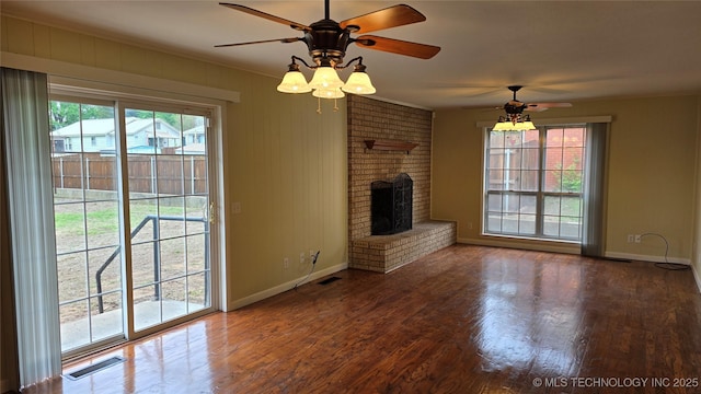 411 S 3rd, Eufaula, OK 74432 - unfurnished living room with a ceiling fan, baseboards, wood finished floors, and crown molding