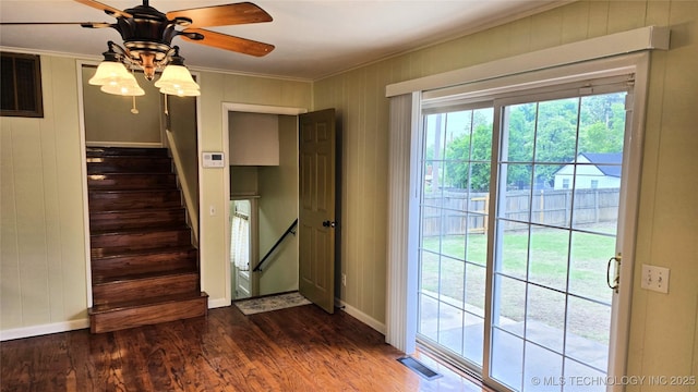 411 S 3rd, Eufaula, OK 74432 - doorway to outside with dark wood-style flooring, ornamental molding, stairs, ceiling fan, and baseboards