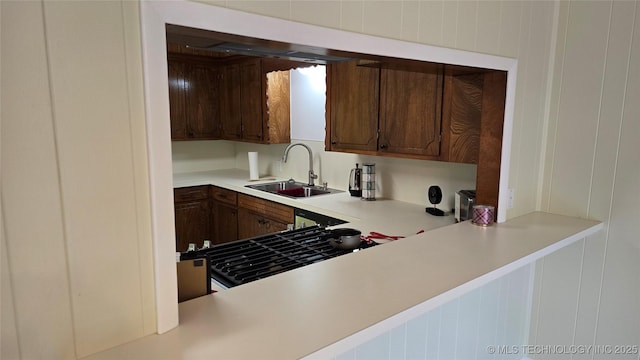 411 S 3rd, Eufaula, OK 74432 - kitchen featuring a sink and light countertops