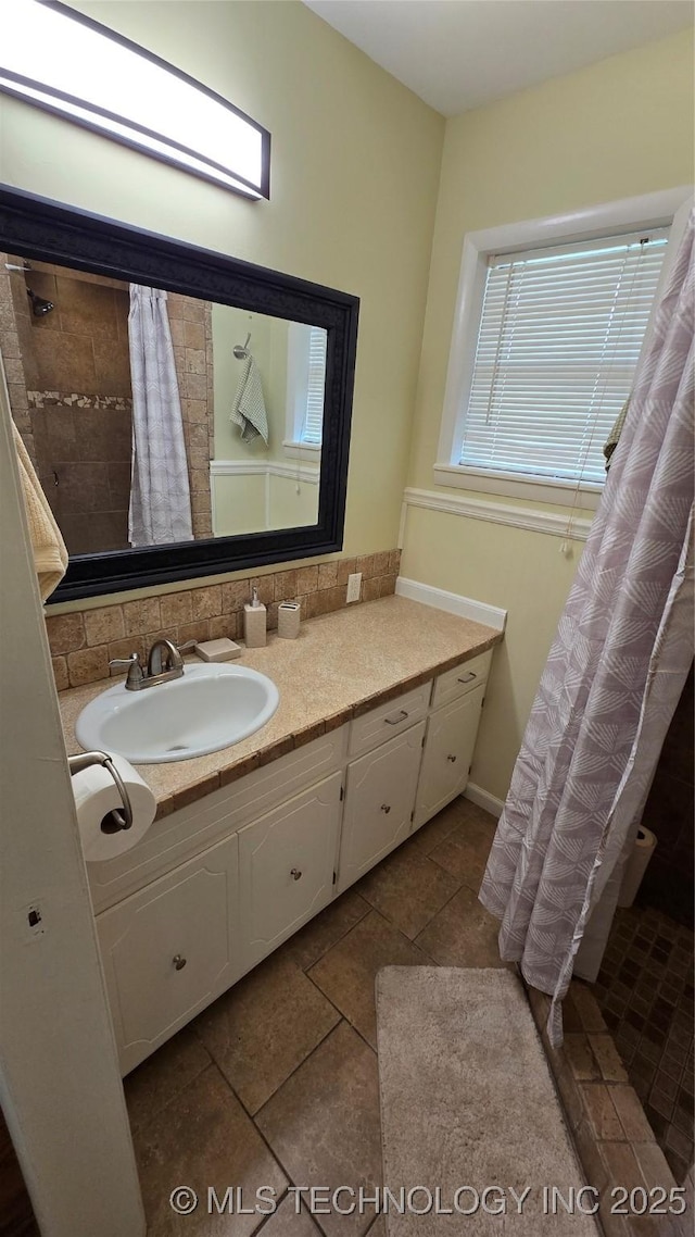 411 S 3rd, Eufaula, OK 74432 - full bathroom with vanity, tile patterned flooring, and tiled shower