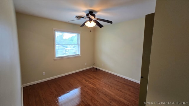 411 S 3rd, Eufaula, OK 74432 - unfurnished room featuring wood finished floors, ceiling fan, and baseboards