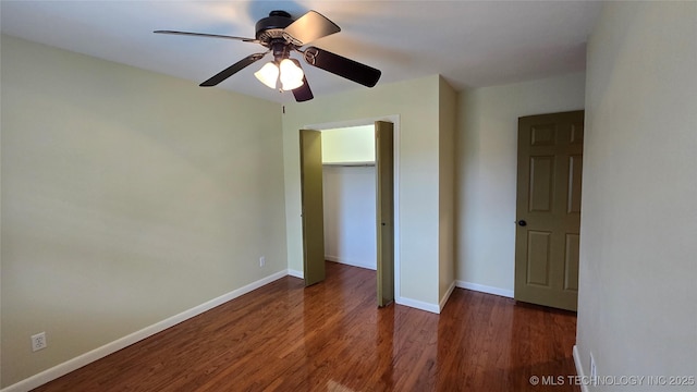 411 S 3rd, Eufaula, OK 74432 - unfurnished bedroom with wood finished floors, baseboards, and a ceiling fan