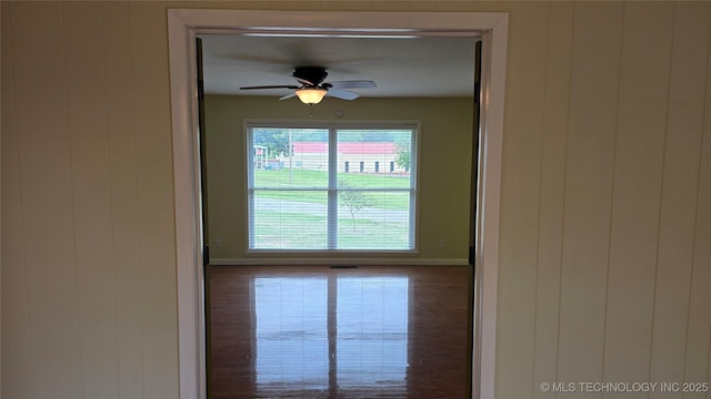 411 S 3rd, Eufaula, OK 74432 - unfurnished room with baseboards, ceiling fan, and wood finished floors